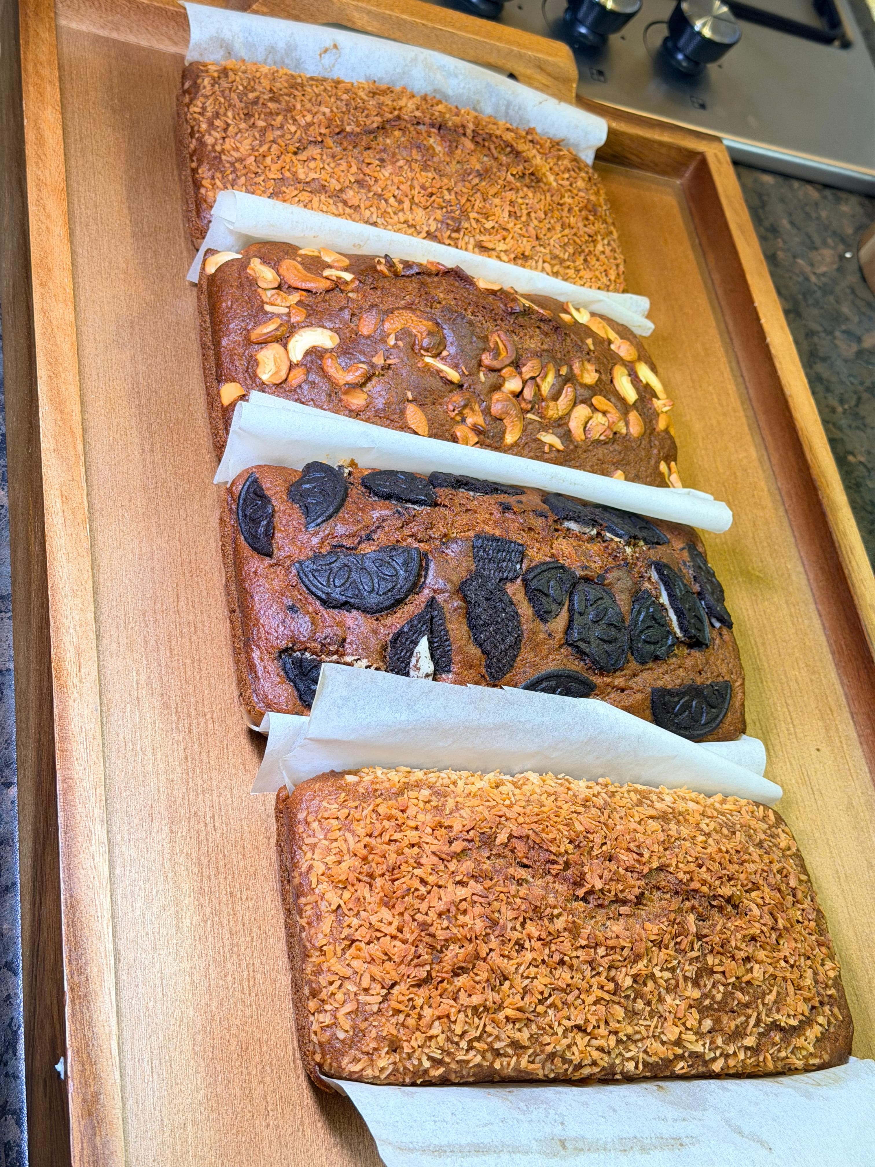 House-baked banana bread loaves, four flavours